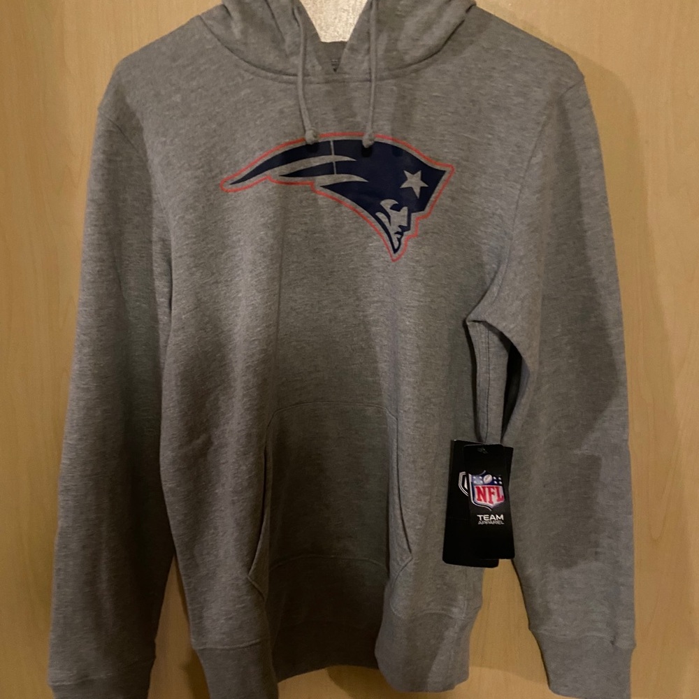 Women’s Patriots hoodie.  New tags on.  Medium.